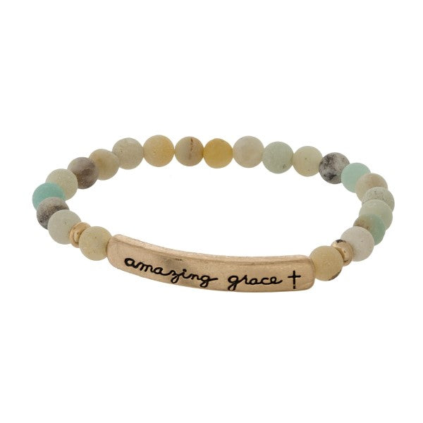 Beaded stretch bracelet with a bar focal, stamped with "amazing grace"